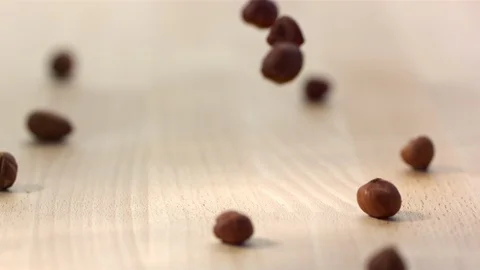 Slow Mo Hazelnuts Fall On Kitchen Counter Stock Footage 108149642