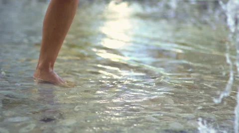 Slow-Mo: Legs Splashing Crystal Clear Shallow Water Outdoors Stock Footage 40010582