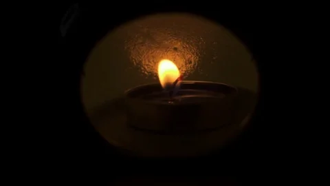 Slow mo light of a candle close up Video stock 82718538
