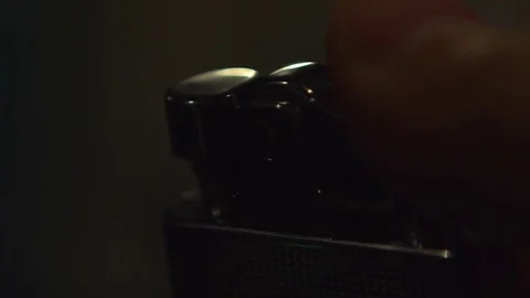 Slow Mo. Lighter sparking many times in male hand. Close up of lighting fire Stock Footage 81500068