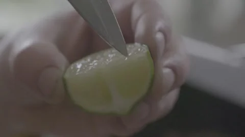Slow Mo lime preparation Stock Footage 163442896