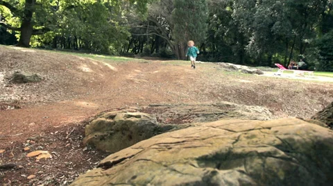 Slow-Mo: Little Boy Running Playfully In Nature Stock Footage 35295949