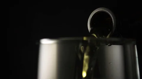 Slow mo macro pouring a glass of beer Stock Footage 72589987