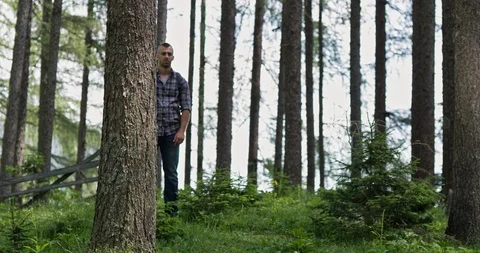 Slow Mo Man In Checkered Shirt Runs Through Woods Stock Footage 112333695