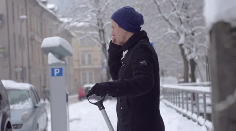 Slow-Mo: Man Finishes Conversation On The Phone  Stock Footage 45391096