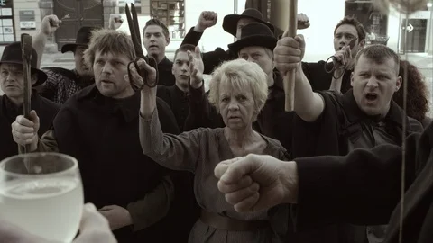 Slow Mo Man Gives Speech And Crowd Protests Stock Footage 120409729