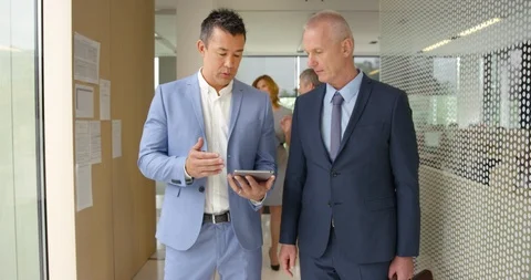 Slow Mo Man In Office Explaining Something Stock Footage 97126004
