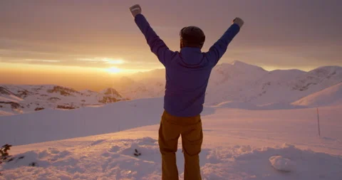 Slow Mo Of Man Reaching The Top Of Mountain Stock Footage 140190097