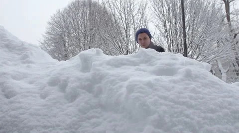 Slow-Mo: A Man Shovels Snow Into The Camera Stock-Footage 45391118