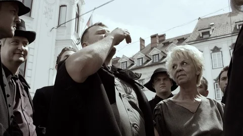 Slow Mo Man Takes Sip Of Water In Town Square Stock Footage 120016550