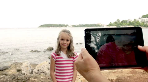 Slow-Mo: Mother Taking Picture Of Her Daughter On The Beach Stock Footage 35297769