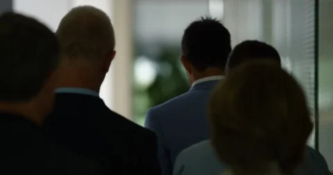 Slow Mo People Walking Down Hallway Stock Footage 97140506