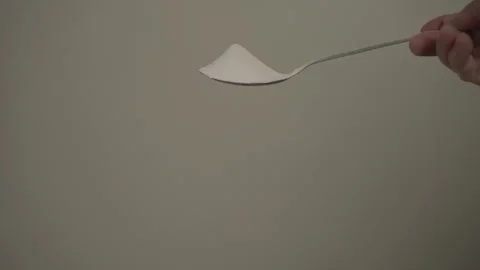 A slow mo of pouring salt 3 Stock Footage 292965801