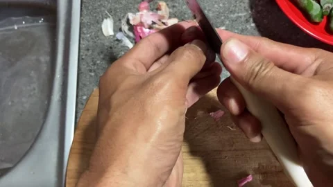 Slow Mo Pov Hands Peeling Shallot With Knife On Wooden Board. Stock Footage 344524186