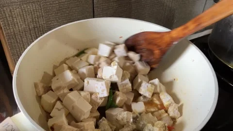Slow Mo Pov Hands Stirring Diced Tofu And Tempeh In Pan. Stock Footage 344524467