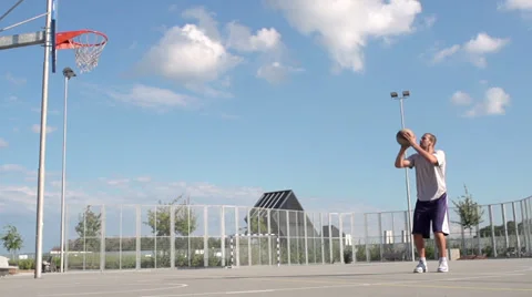 Slow-Mo: Professional Basketball Player Scores A Basket Practising Free Throw Stock Footage 39670422