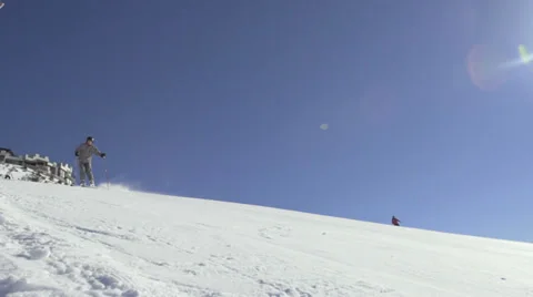 Slow-Mo: Professional Skier Skiing On Sunny Winter Day Stock Footage 33868364