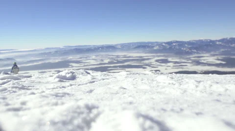 Slow-Mo Rear View Close-Up Of Skis Carving Down The Slope Stock Footage 33866902