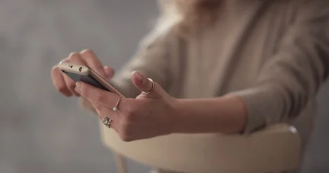 Slow Mo Scrolling Through The News On Smartphone Stock Footage 120794755