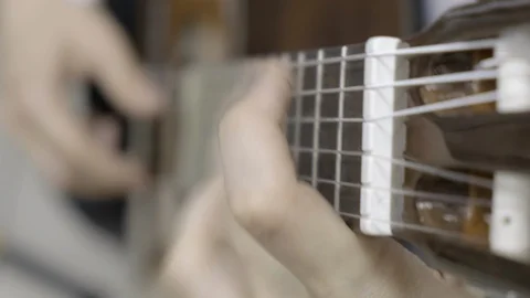 Slow mo shooting fast passage on the guitar Stock Footage 114634612
