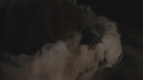Slow-Mo Shot of Hand Closing lid on Smoking Boiling Cauldron Stock Footage 139163320