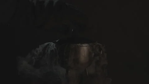 Slow-Mo Shot of Hand Lifting Lid of Boiling Cauldron and Smoke Starts Rising Stock Footage 139162305