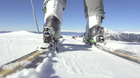 Slow-Mo Of Ski Boots Being Attached To Carving Skis 库存影片 33867114