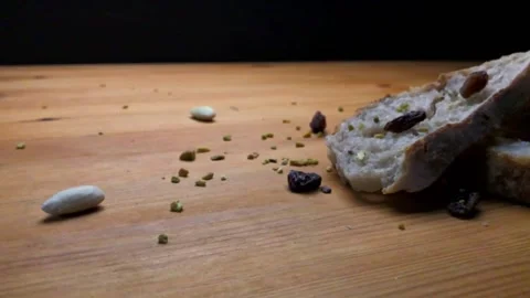 Slow-mo of a slice of sliced fresh homemade bread Stock Footage 131116390
