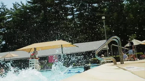 Slow mo splashing in the pool Stock Footage 42571928