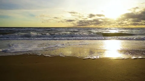 Slow mo the sun shines on the stormy sea Stock-Footage 82129645