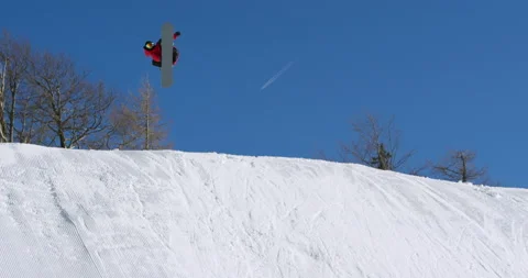 Slow Mo Of Talented Snowboarder Doing Flips In The Air Stock Footage 139746822