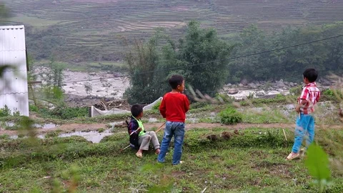 Slow-mo of Three Kids Playing, Sapa Vietnam Stock Footage 104535702