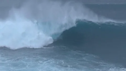 Slow Mo Tracking Shot Huge Hurricane Wave Breaking On Coast Stock Footage