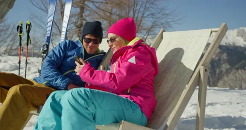 Slow Mo Of Two People Looking At Something On Smartphone Stock Footage 140120413