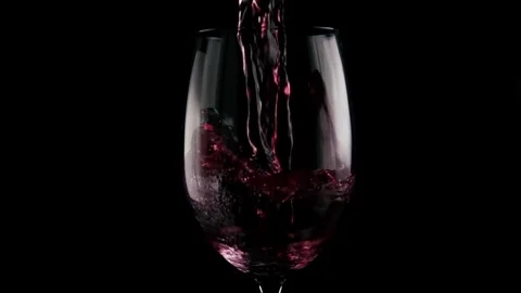 Slow mo. Two wines are mixed in a glass Stock Footage 75955822