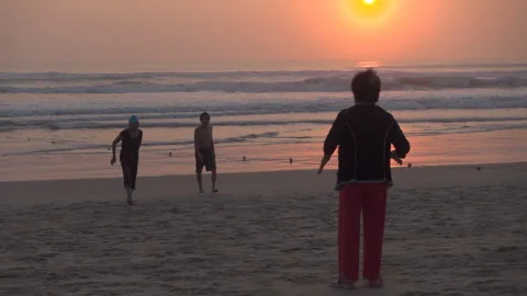 Slow mo video people exercise sunrise at My Khe Beach Stock Footage 271062071