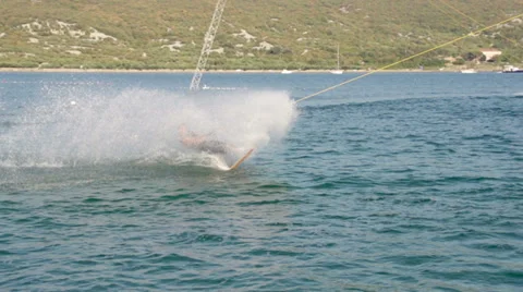 Slow-Mo: Wakeboarder Carving And Making A Splash Stock Footage 36991523