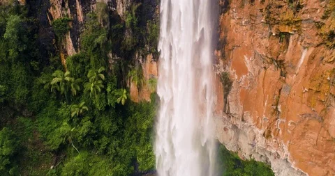 Slow-mo water falling from top of Springbrook Waterfalls Stock Footage 97271785