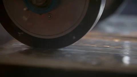 Slow-mo: Weights Running on Pieces of Asphalt for Endurance Test Stock Footage 138803589