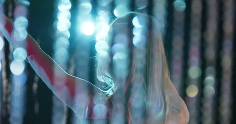 Slow Mo Of Woman Dancing Behind Crystal Curtain Stock Footage 138364829