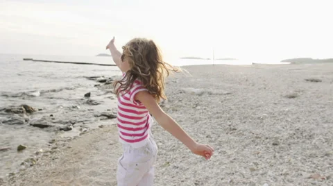 Slow-Mo: Young Girl Dancing On The Beach Stock Footage 35292358