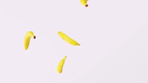 Slow motion 3d animation video of bananas falling from above Видео 237316710