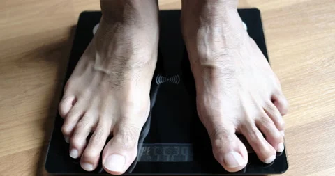 Slow motion 4K Close up foot Man body weight Stock-Footage 141364846