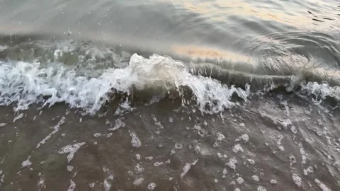 Slow Motion 4K Close-Up Ocean Wave Breaking with Golden Stock Footage 330877781