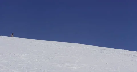 Slow Motion 4K Of Skier Skiing Fast And Snow Spraying On Sunny Winter Day Stock Footage 47089797