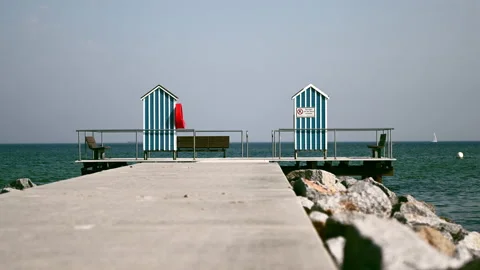 Slow motion 4K video of end of pier and bathing station on Baltic sea Stock Footage 156202156