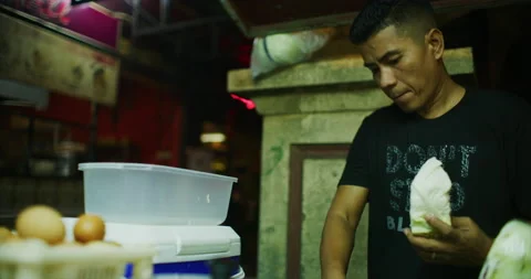 Slow Motion 60 fps of a Ramly Burger Street Food Chef in Miri, East Malaysia Stock Footage 147766982