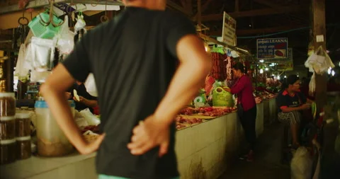Slow Motion 60 fps Shot of a Butcher at The Old Market in Siem Reap, Cambodia Stock Footage 149385332