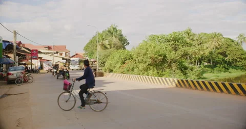 Slow Motion 60 fps Of Traffic Along The Siem Reap River in Siem Reap, Cambodia Stock Footage 151182049