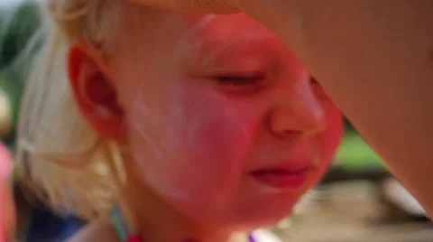 Slow motion 96fps Sun protection face child Stock Footage 40951757